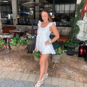 Vici White Ruffled Sleeveless Romper